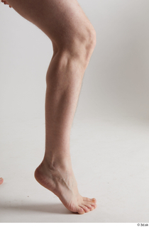 Sigvid  1 calf flexing nude side view 0004.jpg